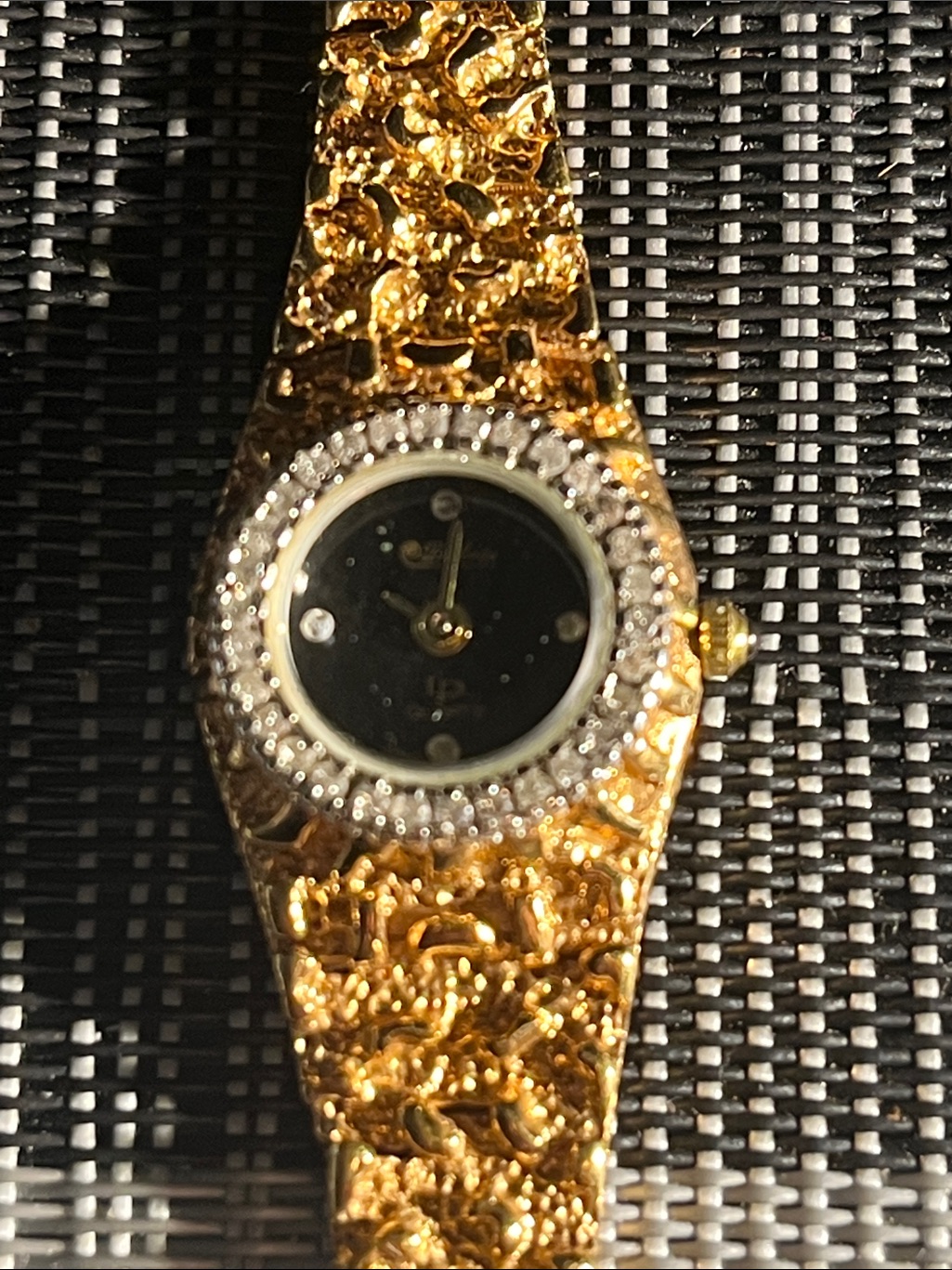 Lucien Piccard Gold Tone Crystal Bezel Watch With Black Dial